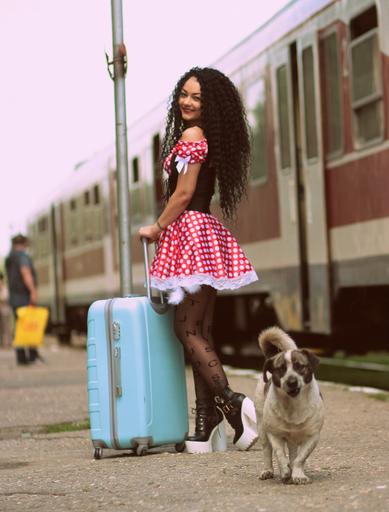 girl train station baggage dog peron dress polka dots red